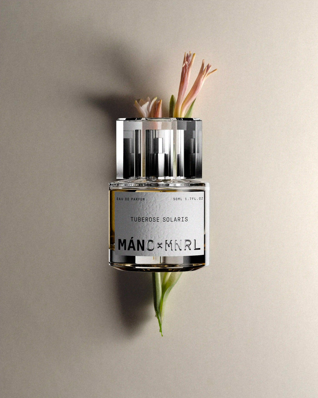 Tuberose Solaris bottle with hero ingredient