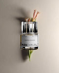 Tuberose Solaris bottle with hero ingredient